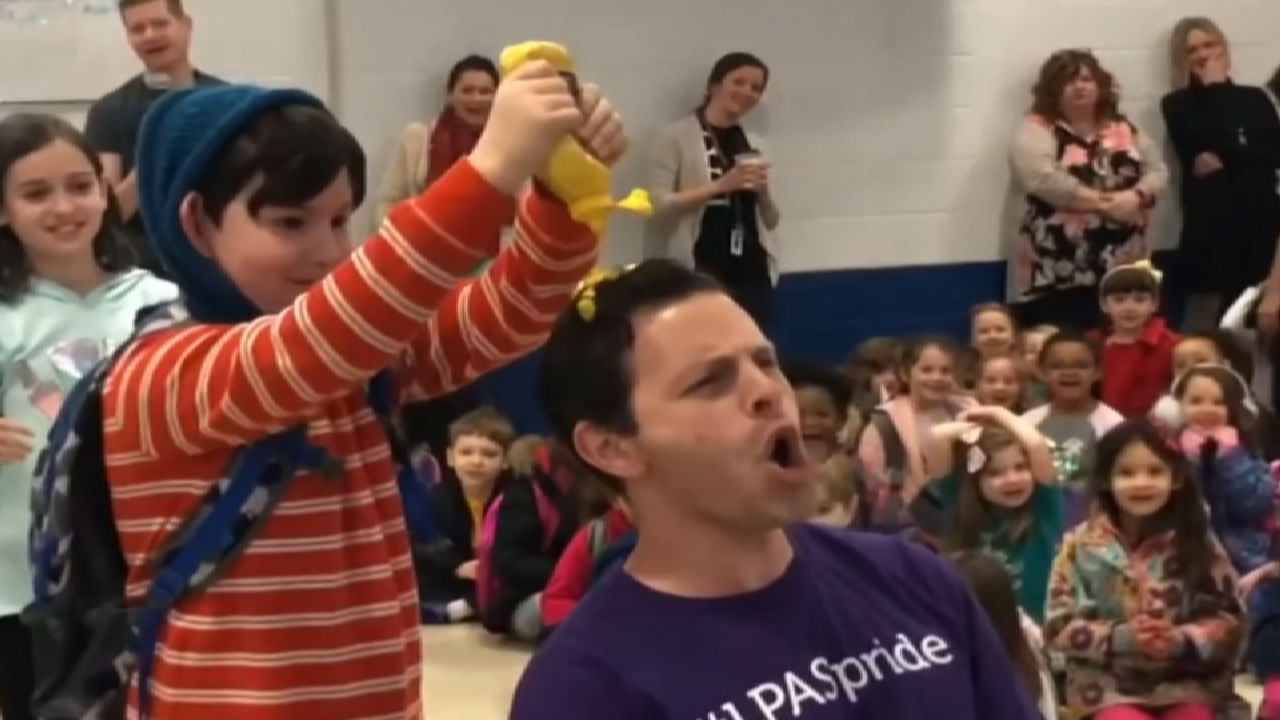 Louisville educator honored with international award, wins tropical vacation